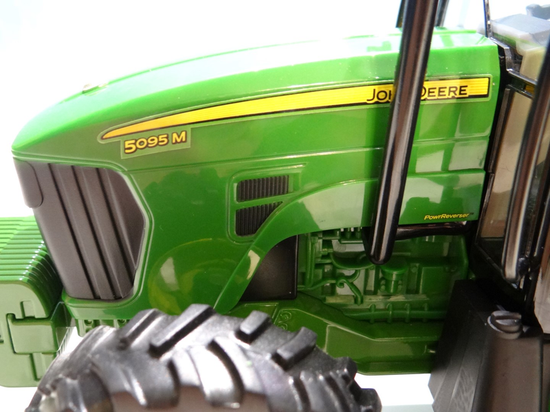 Illustration for article titled Tractor Thursday 1:16 ERTL John Deere 5095M w/ Mower